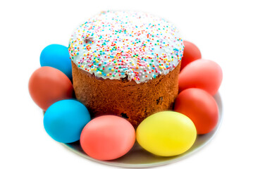 Cake and colored eggs on a platter. Easter lunch. The feast of Holy Easter. Painted eggs.