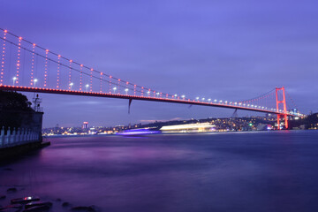 Fototapeta na wymiar Bosphorus bridge (15 Temmuz Sehitler Koprusu) at night scene, Istanbul, Turkey