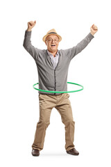 Full length portrait of an excited elderly man spinning a hula hoop © Ljupco Smokovski