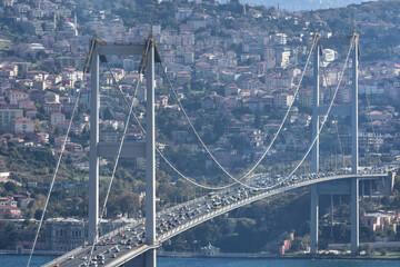 15th July Martyrs Bridge (in Turkish 15 Temmuz Sehitler Koprusu ) Bosphorus Bridge, Istanbul, Turkey with panoramic view of the city. Traffic in Istanbul