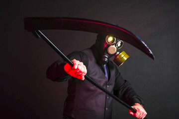 cosplay of a guy in a gas mask with glowing eyes with a black braid on a dark background