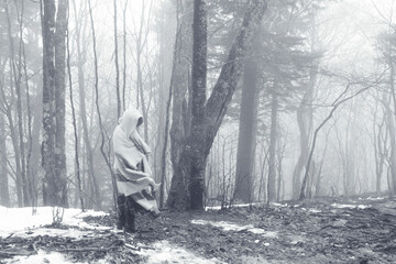 woman in the snowy forest