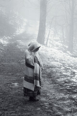 woman in the snowy forest