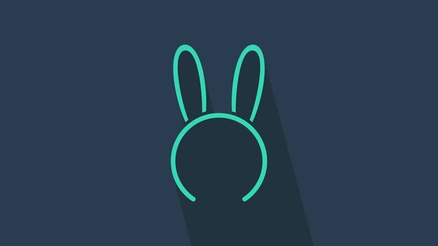 Turquoise Mask with long bunny ears icon isolated on blue background. Fetish accessory. Sex toy for adult. 4K Video motion graphic animation.