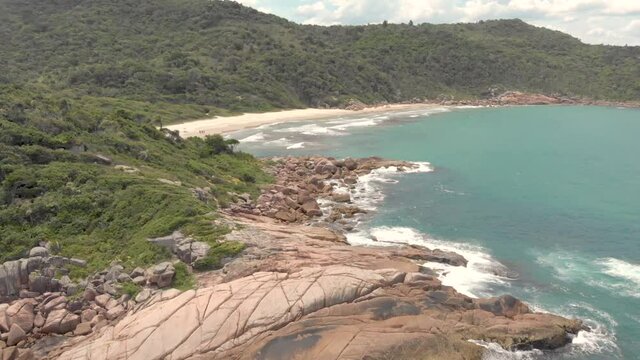 a drone flying over the bech of Bombinhas