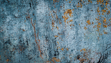 old orange and blue cracked paint on the wall