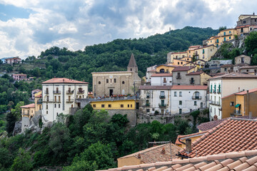 Fototapeta na wymiar View of the typical village of Castelmezzano with the church of Santa Maria dell'Olmo, province of Potenza, Basilicata, Italy