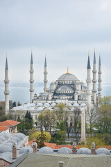 View of Famous tourist place the Blue Mosque (Turkish: Sultanahmet mosque), between buildings...