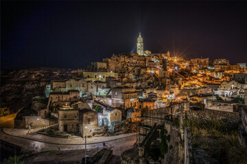 Beautiful night cityscape of Matera with the cathedral in the highest point of the city, Basilicata, Italy