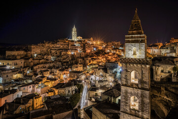 Fototapeta na wymiar Night cityscape of Matera old town viewed from Sasso Barisano, Basilicata, Italy