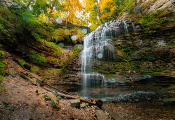 A dramatic view of Tiffany Falls in autumn