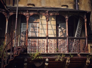 KASHIPUR RAJBARI, WEST BENGAL, INDIA- 30 November 2019. A vintage house with a abandoned balcony , broken doors, staircases 