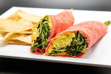 Curry chicken wrap loaded with layers of ingredients of delicious food for this meal.