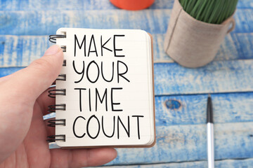 Make your time count, text words typography written on book, life and business motivational inspirational concept