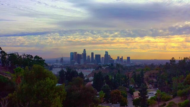 Flying away from the Los Angeles skyline and a beautiful sunset.