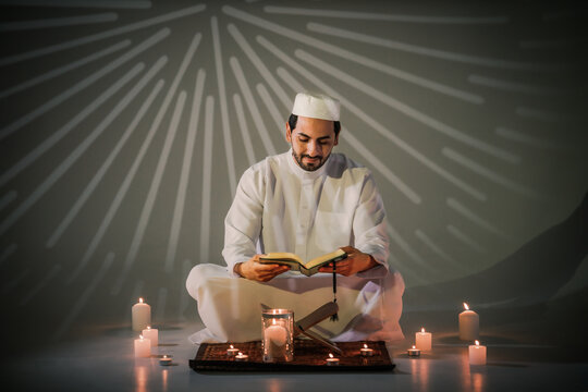 Muslim Prayer Sitting In Mosque And Read Holy Al Quran Book