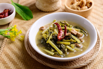 Northern Thai food (Pak Kad Jor), Sour soup Thai flowering bok choy with pork eating with dry chili, pork rind and sticky rice