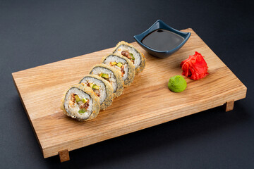 Fried sushi rolls with crispy covering and soy sauce