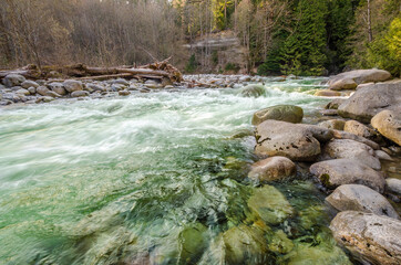 Majestic mountain river with mountain background in Vancouver, Canada.