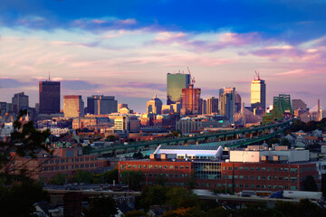 Fototapeta premium Boston city skyline with bridges and highways at dusk