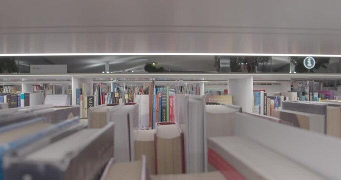 Empty Library Scene,Shelves holding books,Education,Fiction,Novel,Poetry, Drama, Prose, Nonfiction, and Media