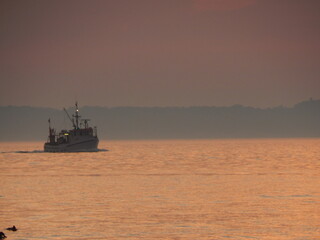 Obraz premium fishing boat in the sea