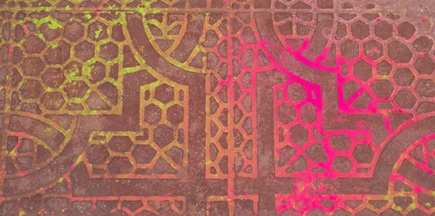 colorful holi powder on floor tiles at city palace in jaipur