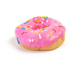 Strawberry flavoured donut with sprinkles on white background. One pink doughnut isolated picture. Homemade bakery concept.