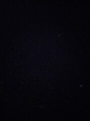 Stars in the open sky at night.