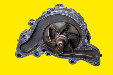 car water pump on yellow isolated background.