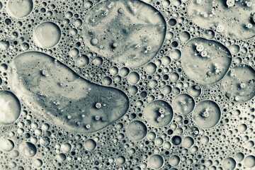acrylic bubbles abstract background gray color.Wallpaper pattern. Fluid art texture. 