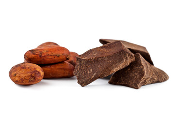 Cocoa beans with cocoa pieces isolated on a white background. Macro photography.
