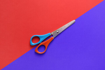 Scissors for paper on color background