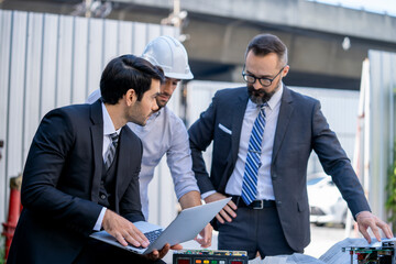Two businessmen and energy engineers partners discussing new project about energy solar panel. © visoot