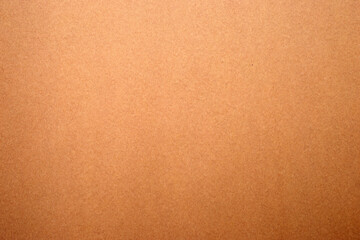 Sheet of brown paper texture for background.
