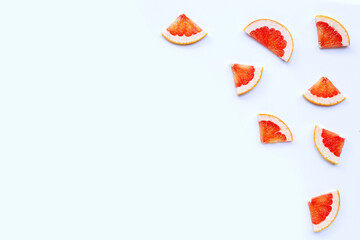 High vitamin C. Juicy grapefruit slices on white.