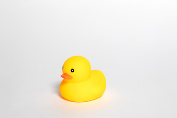 Yellow rubber bath duck isolated on white background
