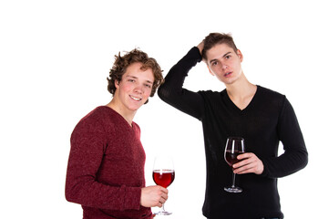 Holidays and weekends. Young attractive couple drinking red wine. White background.