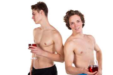 Holidays and weekends. Young attractive couple drinking red wine. White background.