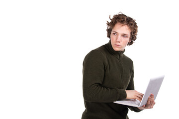 Young attractive student with laptop over white background.