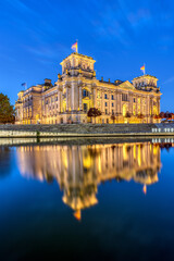 Fototapeta na wymiar The Reichstag at the river Spree in Berlin at dawn