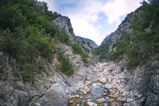 A mountain river at the bottom of a canyon