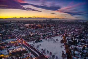 Fototapeta na wymiar Aerial View of Cherry Creek at Sunset with fresh Snow