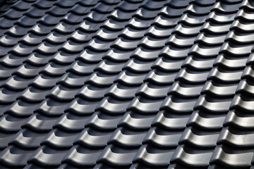 silhouette of roof tile home building for background.