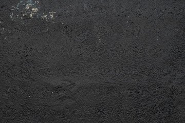 Vintage grunge texture of old weathered dirty wall. Painted cracked walls, textured in cracks and drips of paint. Unique scenic unusual background. Cement wall with stain marks. A texture of an old