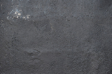 Vintage grunge texture of old weathered dirty wall. Painted cracked walls, textured in cracks and drips of paint. Unique scenic unusual background. Cement wall with stain marks. A texture of an old
