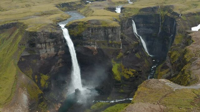 Haifoss waterfall in Iceland, Aerial view. Natural wonder Landmannalaugar canyon.