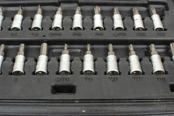 attachments for loosening bolts and nuts in a black box