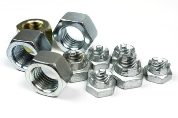 metal nuts of different types on a white background