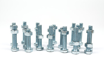 metal nuts and bolts on a white background
